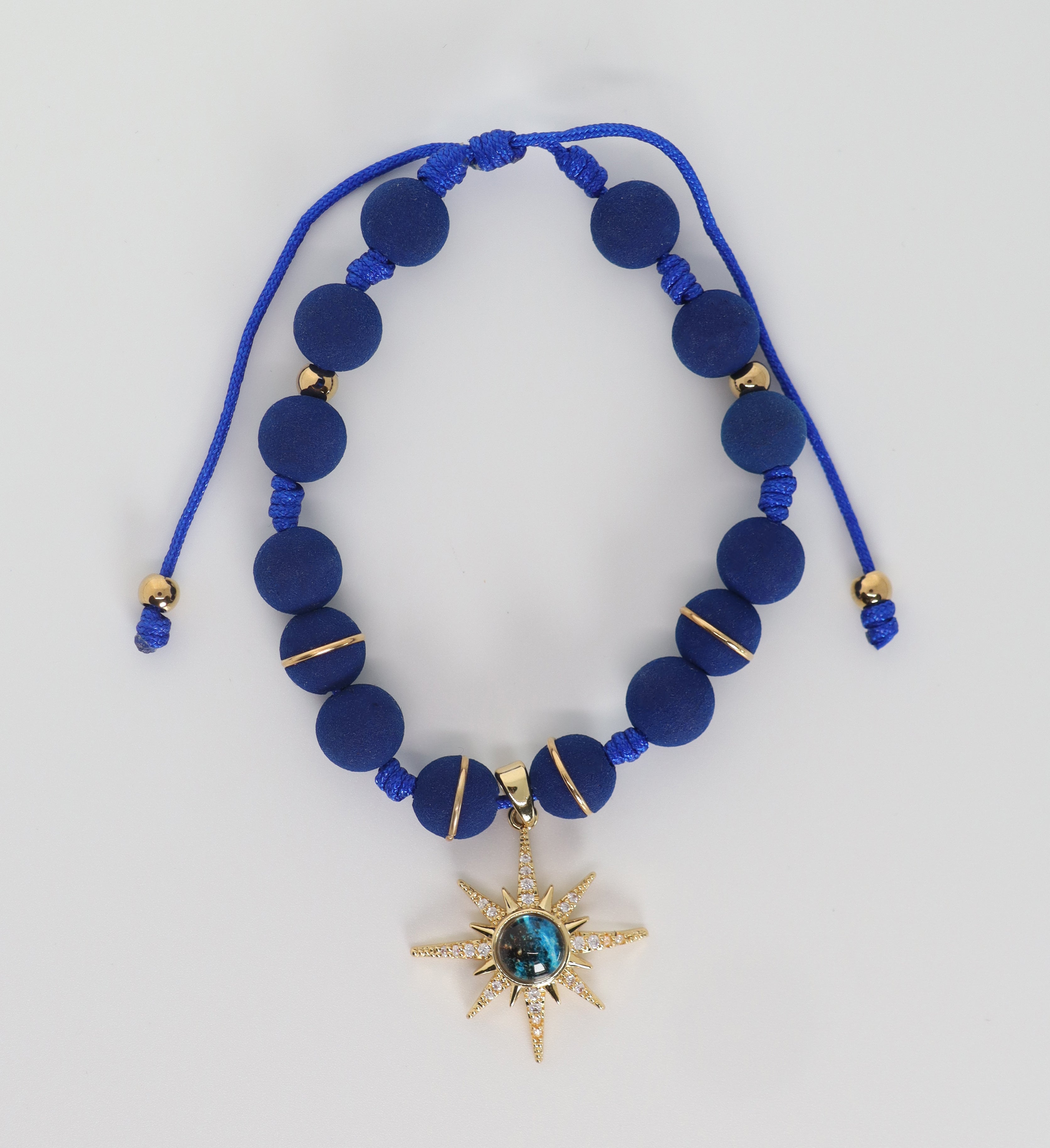 Royal Blue Bracelet With A Golden Star